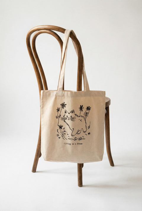 living in a dream organic cotton tote bag