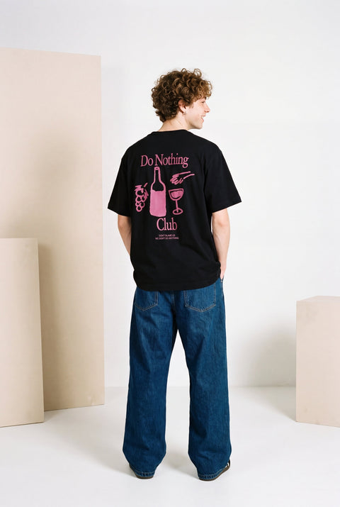 do nothing club black unisex t-shirt with fuchsia print