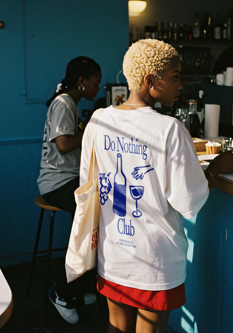 do nothing club unisex creamy white t-shirt with back print