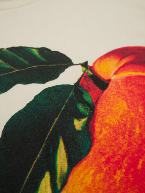 Peachy orange unisex natural raw t-shirt te koop bij Almost Summer Amsterdam 10031