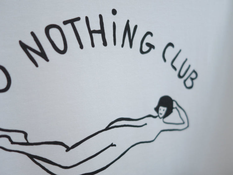 DO NOTHING GIRL white organic cotton unisex t-shirt te koop in de webshop van Almost Summer Amsterdam