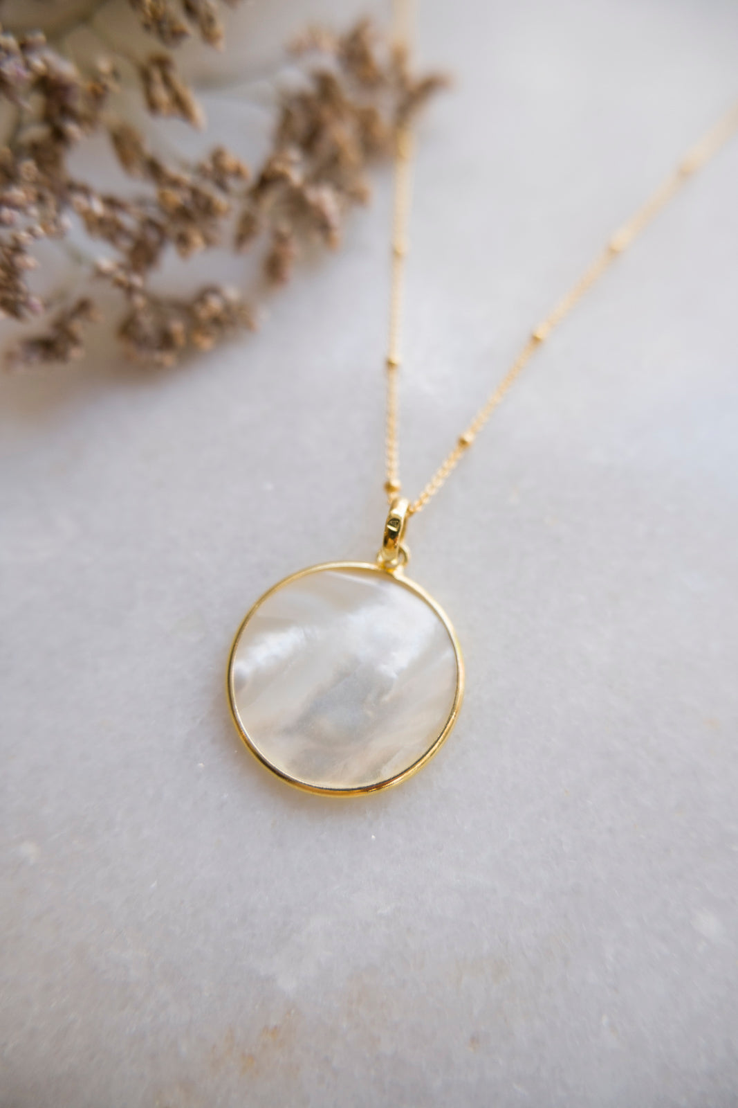 mother of pearl disk necklace
