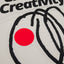 red dot logo oversized organic tee chaos and creativity