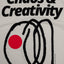 red dot logo oversized organic tee chaos and creativity