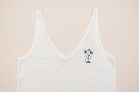 white linen tank top with flower