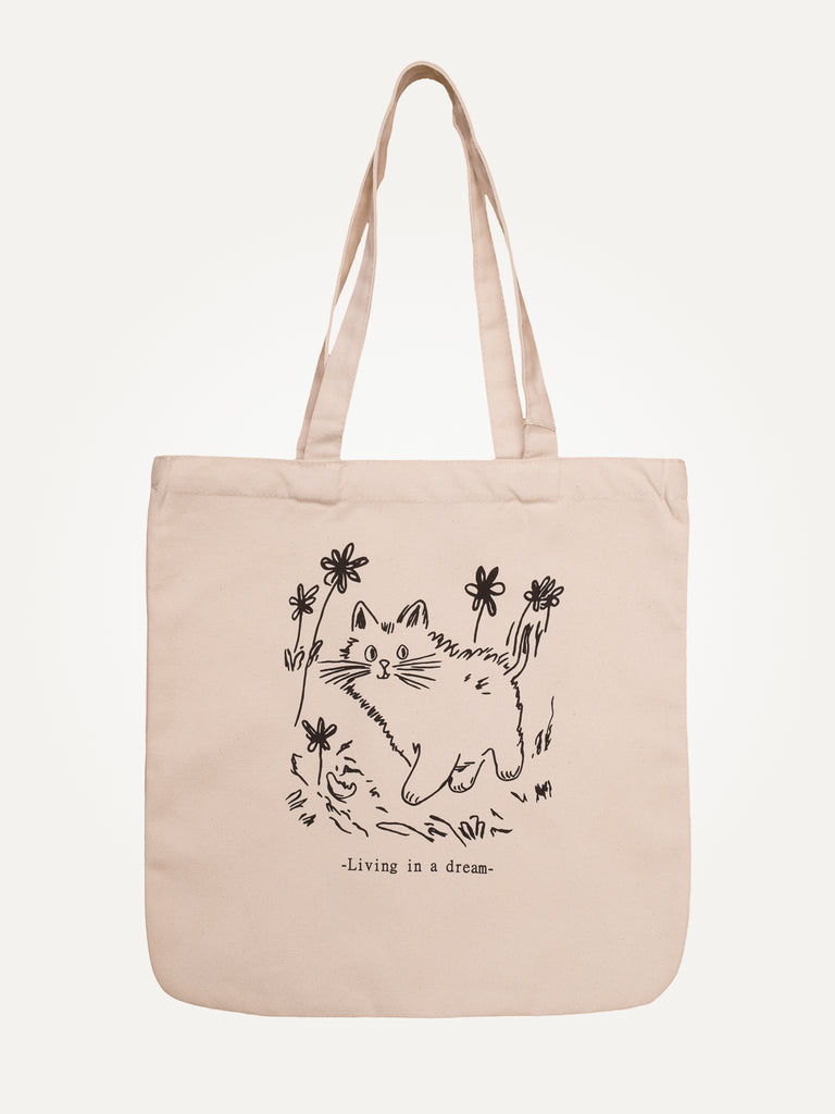 living in a dream organic cotton tote bag