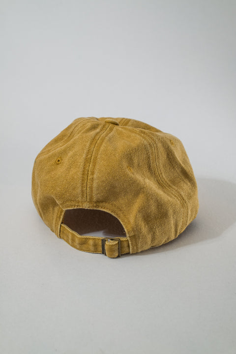 millennial holiday dad hat faded ocre