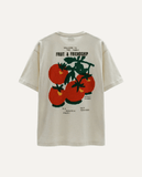 Beige t-shirt with tomato graphic and text on a white background