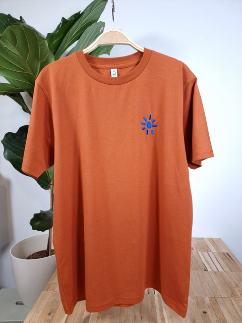 blue sun on dark orange organic cotton unisex tshirt te koop bij Almost Summer Amsterdam 11044