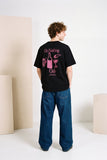 do nothing club black unisex t-shirt with fuchsia print