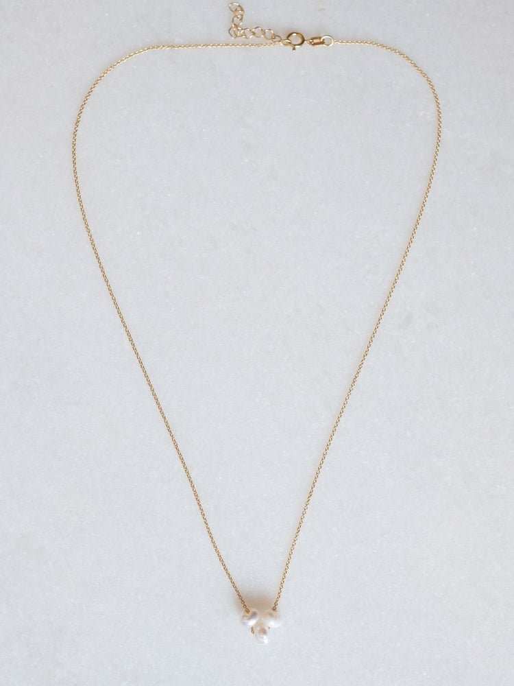 3 small delicate pearls necklace te koop in de webshop van Almost Summer Amsterdam