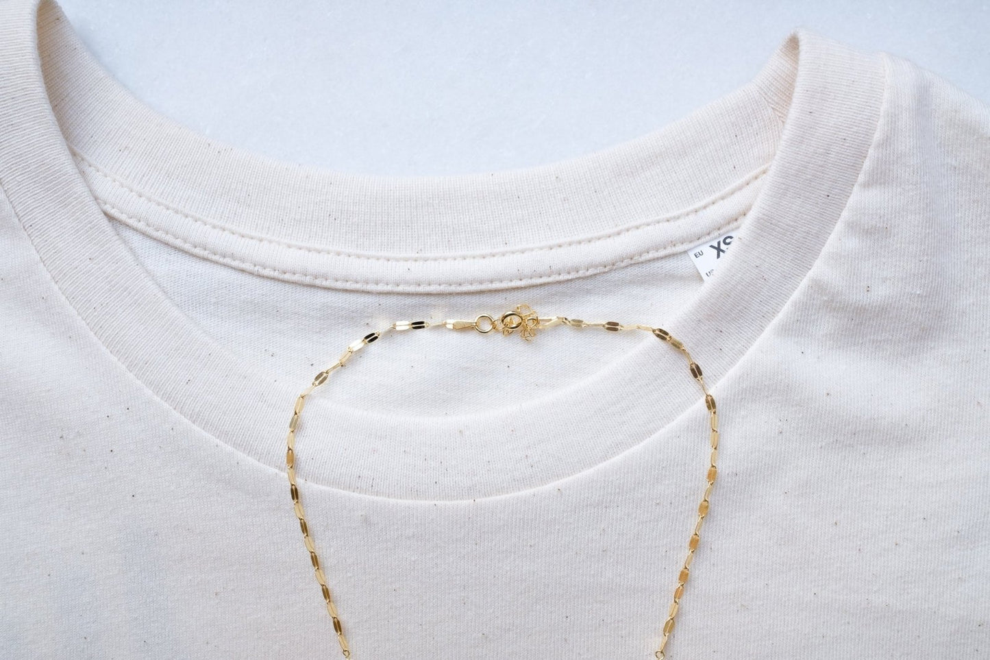 6 small pearls on flat chain necklace te koop in de webshop van Almost Summer Amsterdam