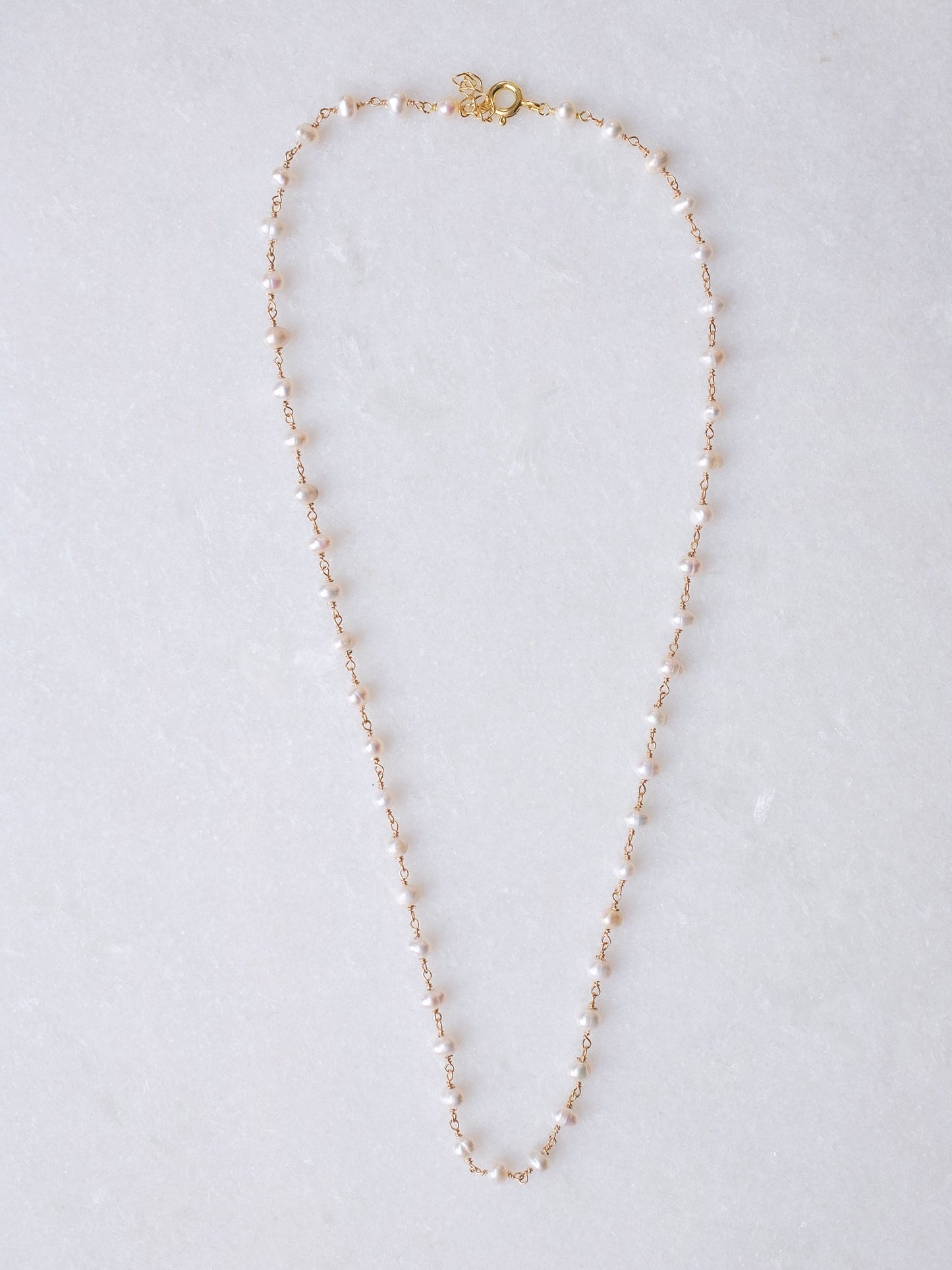 micro pearls necklace te koop in de webshop van Almost Summer Amsterdam