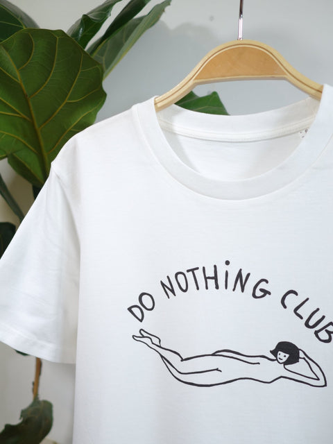 DO NOTHING GIRL white organic cotton unisex t-shirt te koop in de webshop van Almost Summer Amsterdam