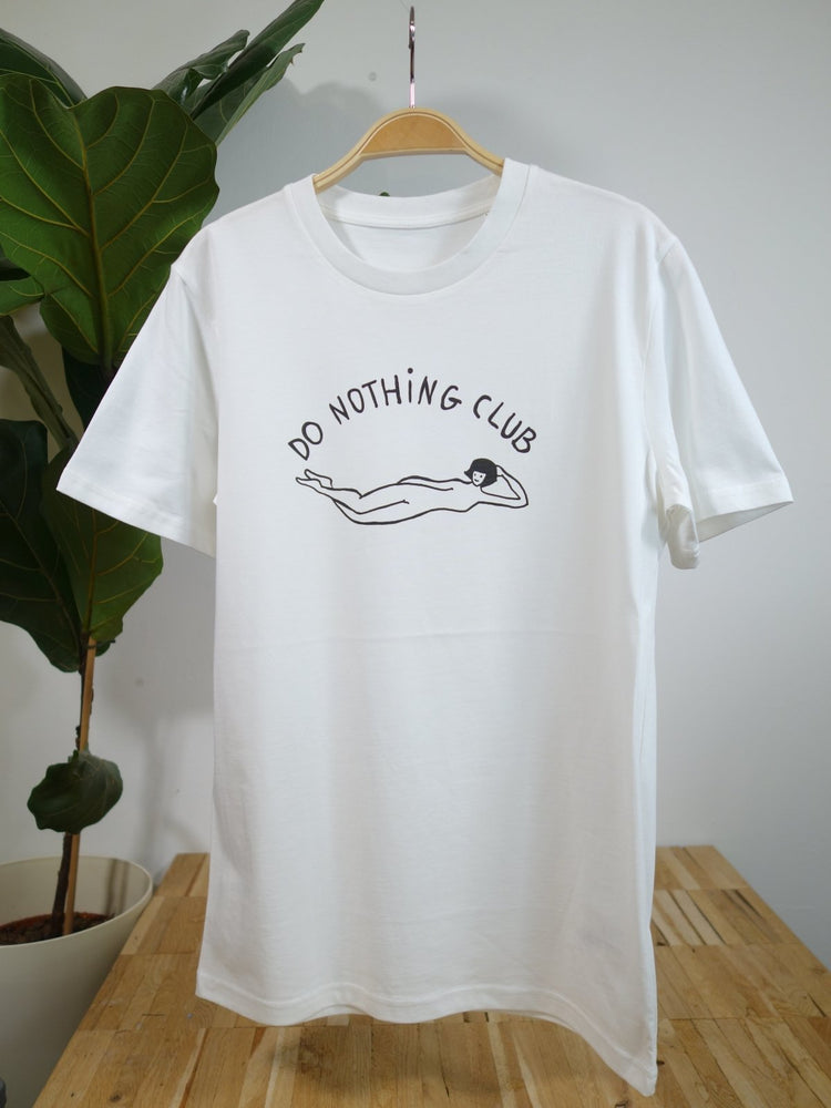 DO NOTHING GIRL white organic cotton unisex t-shirt te koop in de webshop van Almost Summer Amsterdam