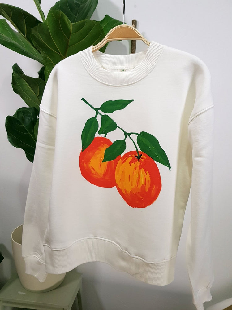 oranges white organic cotton womens sweater te koop in de webshop van Almost Summer Amsterdam